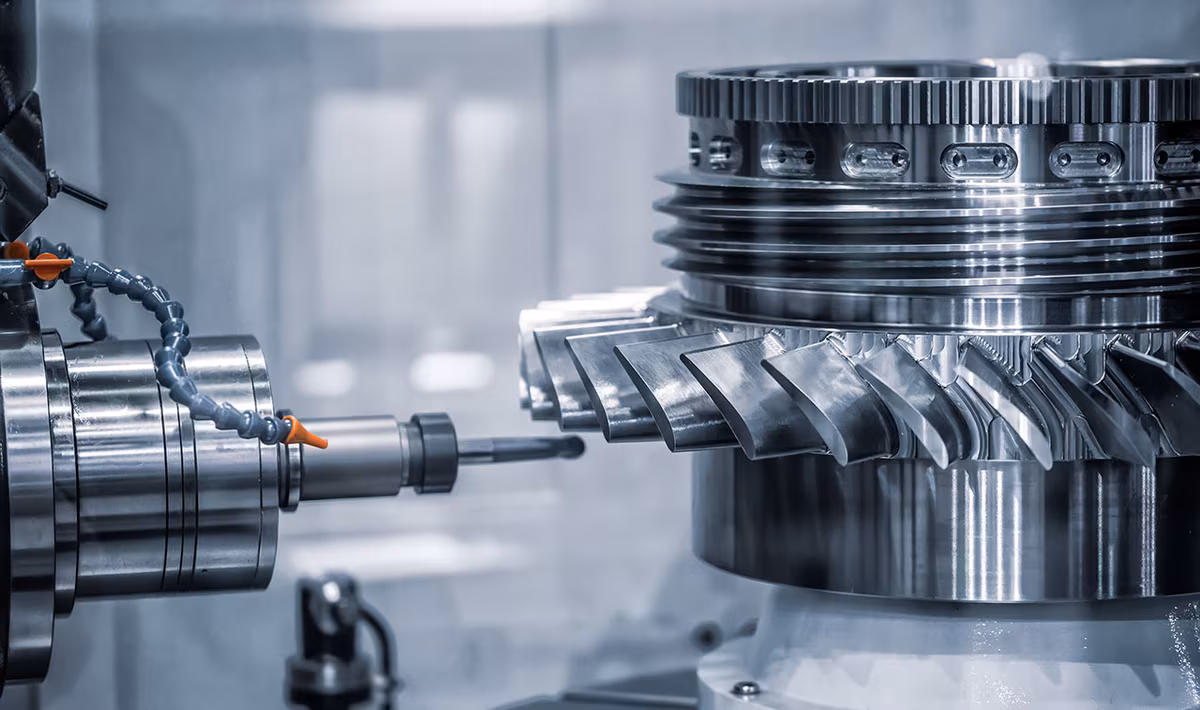 CNC turning center machining a precision shaft